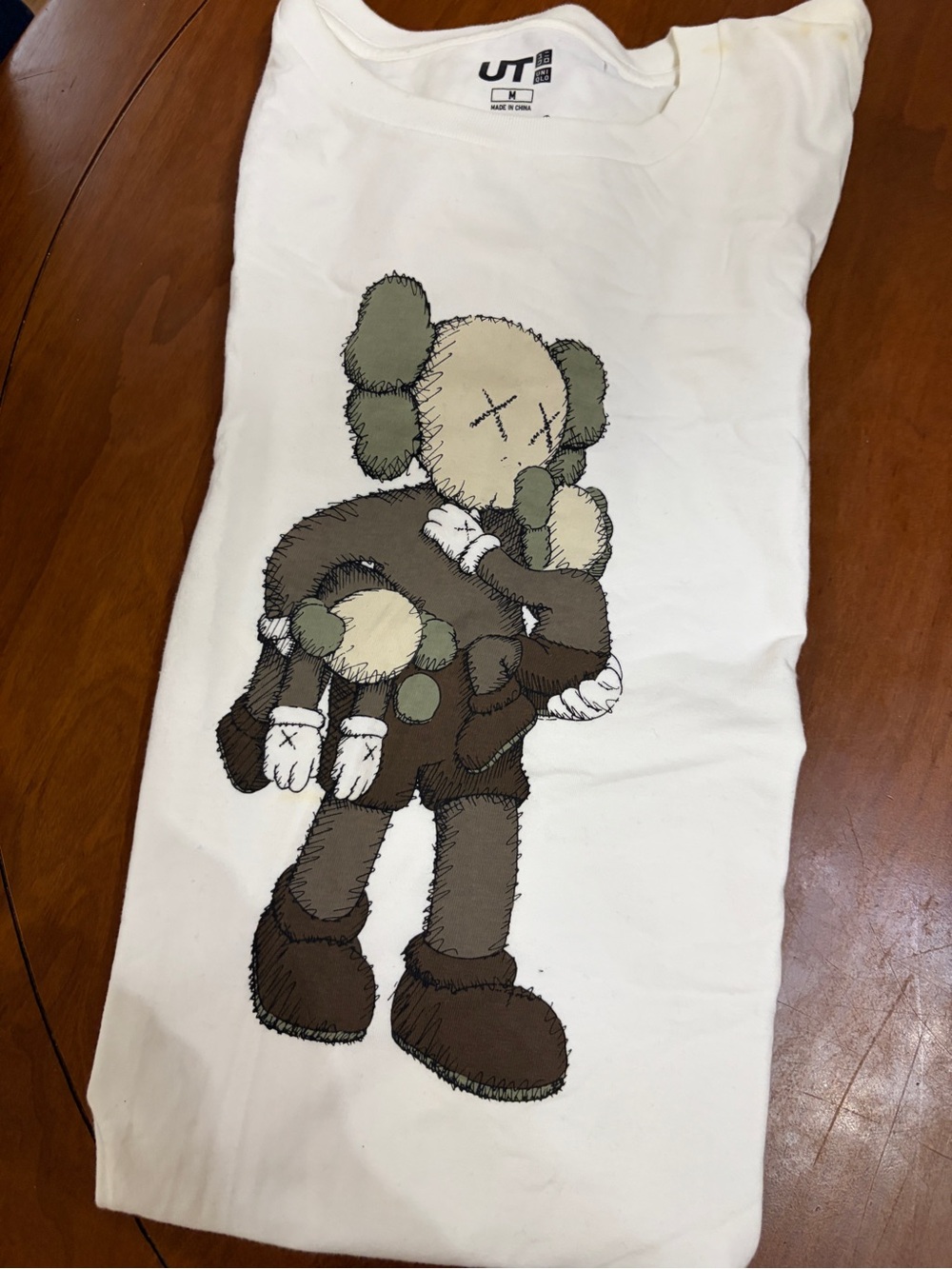 Uniqlo White Tee with KAWS Companion in Brown & Olive